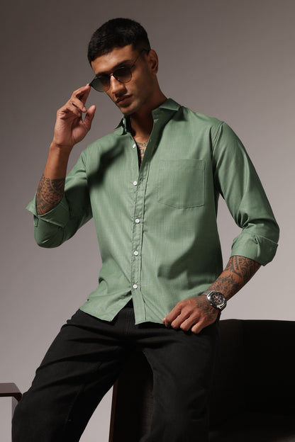 sage green shirt